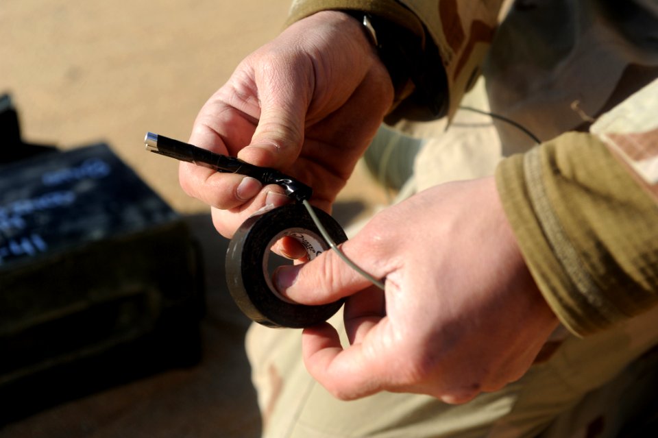 US Navy 111213-N-BA263-544 xplosive Ordnance Disposal Technician 1st Class Mike Dillon, assigned to Commander, Task Group (CTG) 56.1, prepares a no