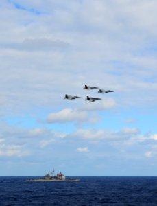 US Navy 111209-N-XE109-148 Jets perform a fly-by