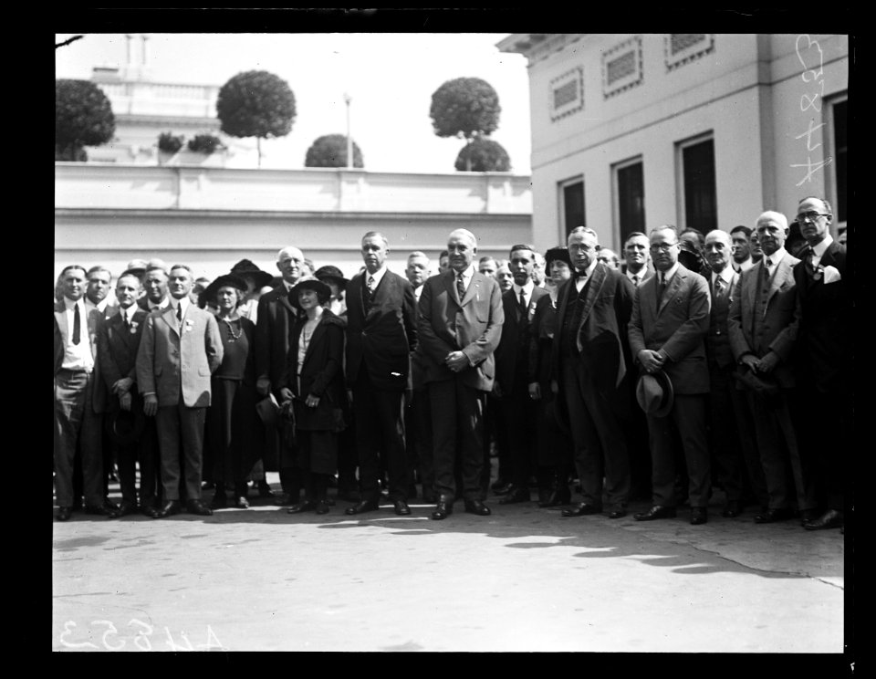 Warren Harding and group outside White House; includes Hubert Work to left of Harding. Washington, D.C. LCCN2016891705