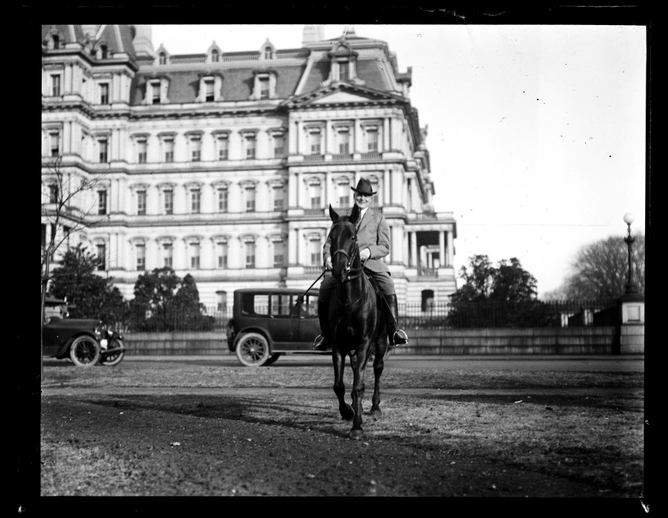 Warren Harding on horse; State, War and Navy Building in background. Washington, D.C. LCCN2016890960