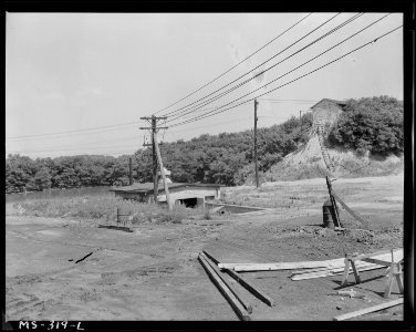 Wash water supply for mine. Picture shows water flowing into reservoir, pump house and water storage house. (Upper... - NARA - 540354
