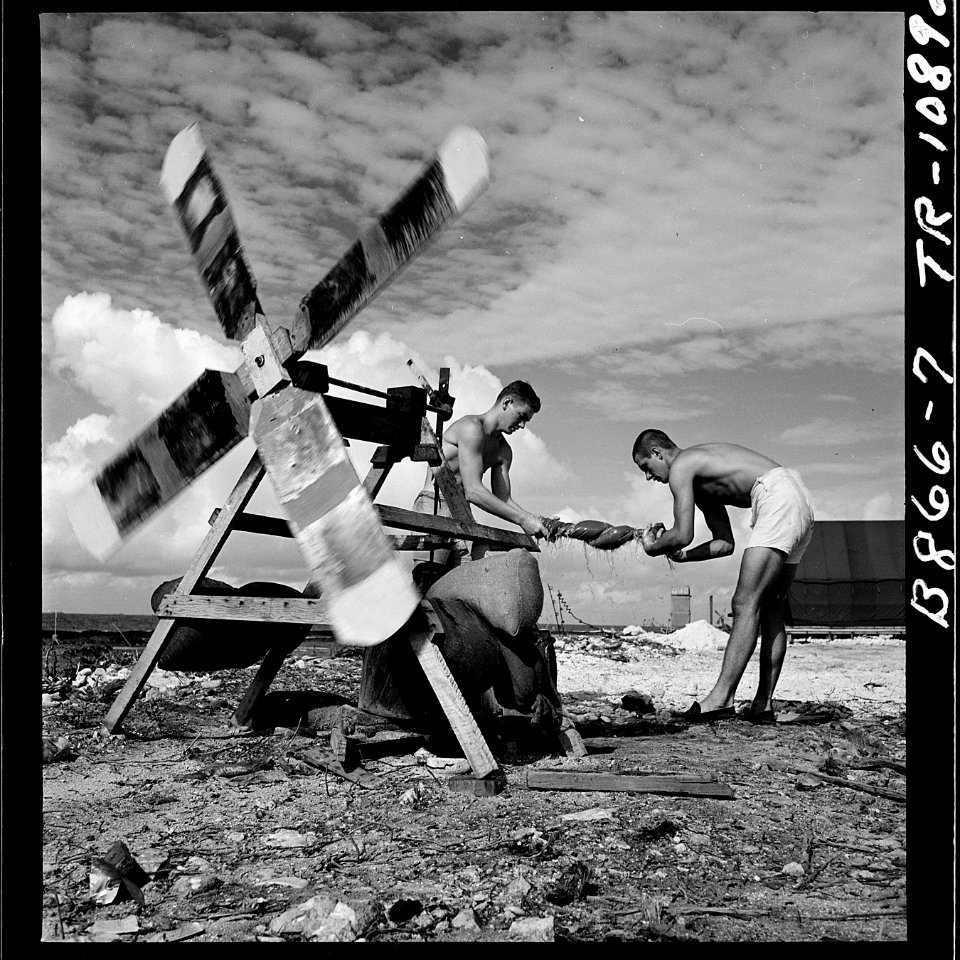 Washing machines used on Eniwetok Island. Even the Marine inventors of the wind-driven machine admit it isn't yet... - NARA - 520725