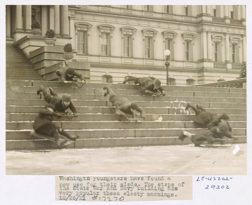 Washington youngsters have found a new use for their sleds. The steps of the State War and Navy building are very popular these sleety mornings LCCN2002695718