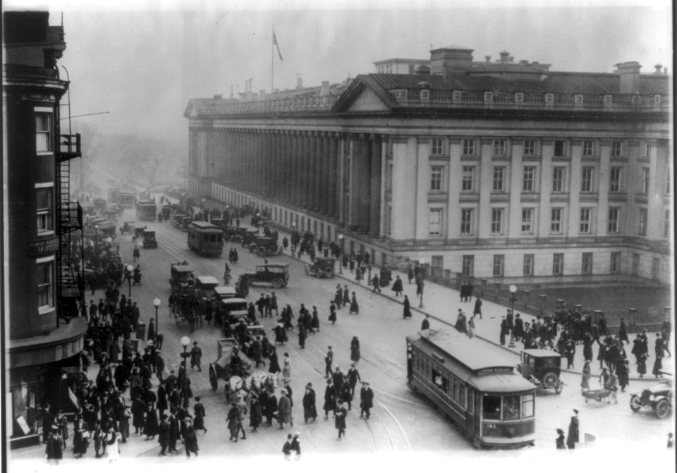 Washington, D.C. - Treasury Building from corner of 15th & G St., crowded with traffic, low aerial view LCCN2001706169