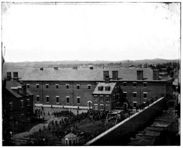 Washington, D.C. Execution of the conspirators- scaffold in use and crowd in the yard, seen from the roof of the Arsenal LOC cwpb.04198