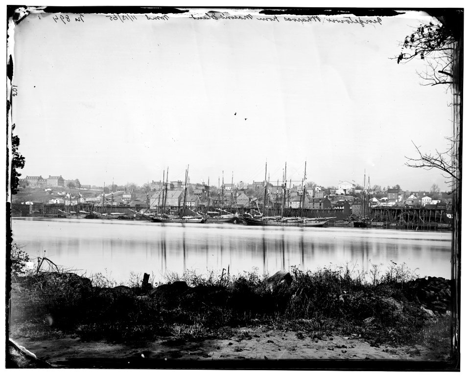 Washington, D.C. Georgetown waterfront with sailing vessels, seen from Mason's Island LOC cwpb.04297