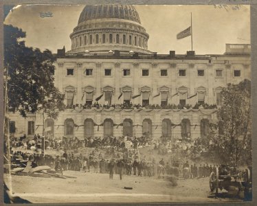 Washington, D.C. Spectators at side of the Capitol, which is hung with crepe and has flag at half-mast during the grand review of the Union Army LCCN2009633717