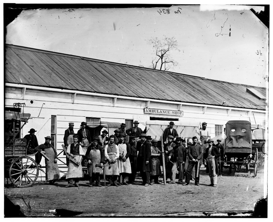 Washington, D.C. Workmen in front of the Ambulance Shop LOC cwpb.04256