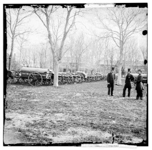 Washington, District of Columbia. Wiard gun at U.S. Arsenal. (L to R- Gen. Daniel Sickles, N.P. Willis, H.L. Stuart) LOC cwpb.01444