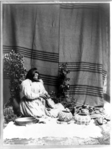 Washo basketmaker Datsolali with her baskets LCCN93508741