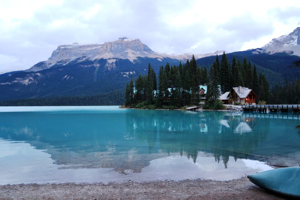Emerald lake water reflection firs