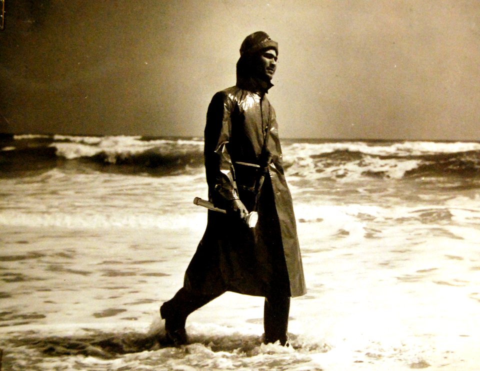 Watchman of Pea Island Station, North Carolina patrols beach for a craft in distress, 1942 (23650913724)