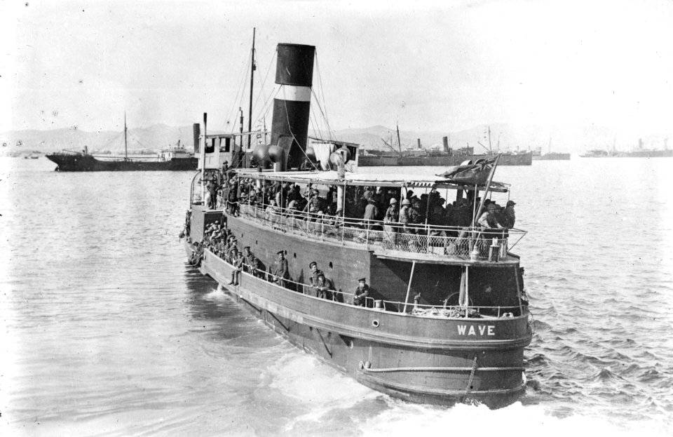 Wave (1914) leaving HMS Magnificent (1894) with troops for Gallipoli. RMG P21202