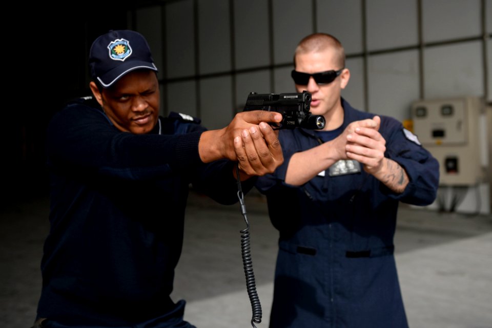 Weapons-handling drills 150114-N-RB579-100