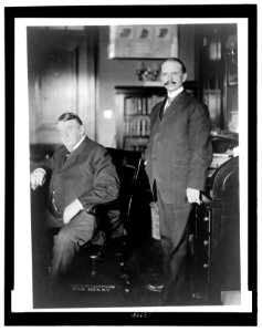 Weldon B. Heyburn (seated), Republican representative from Idaho, with secretary H. B. Smith (standing) LCCN2007683539