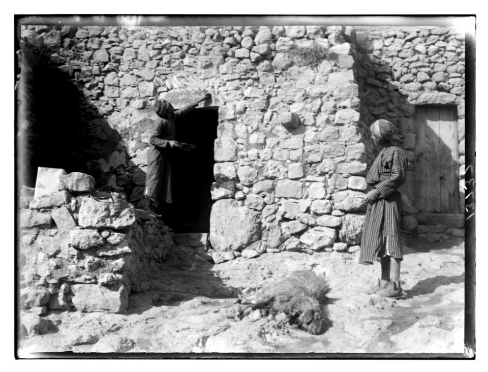 Weli of Budrieh at Sherafat and the preparing of a sacrifice. Smearing the blood of the sacrifice over the door LOC matpc.04622