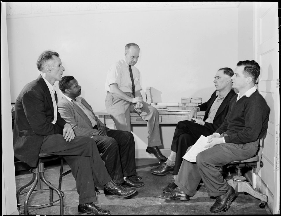Wheelwright Employee's Association meeting from left to right are, Roy Thomas, Will Simmons, C. R. Miller, Treasurer... - NARA - 541488