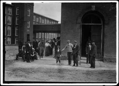 While I was photographing these workers, the watchman dragged out the smallest boy, saying, Here photograph Pewee.... - NARA - 523444