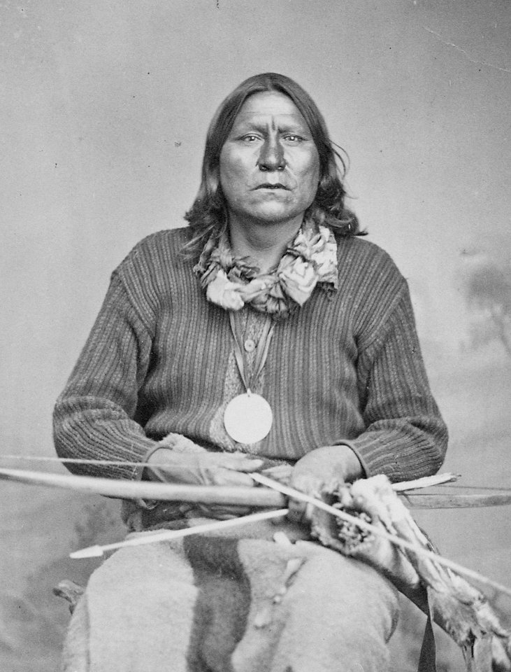 White Bear (Sa-tan-ta), a Kiowa chief, full-length, seated, holding bow and arrows, 1869 - 1874 - NARA - 518901 (cropped)