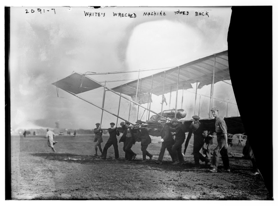 White's wrecked machine towed back LCCN2014688629