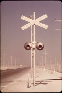 White-dust-on-railroad-crossing-has-floated-over-from-gypsum-plant-at-plaster-city-may-1972 7136441375 o photo
