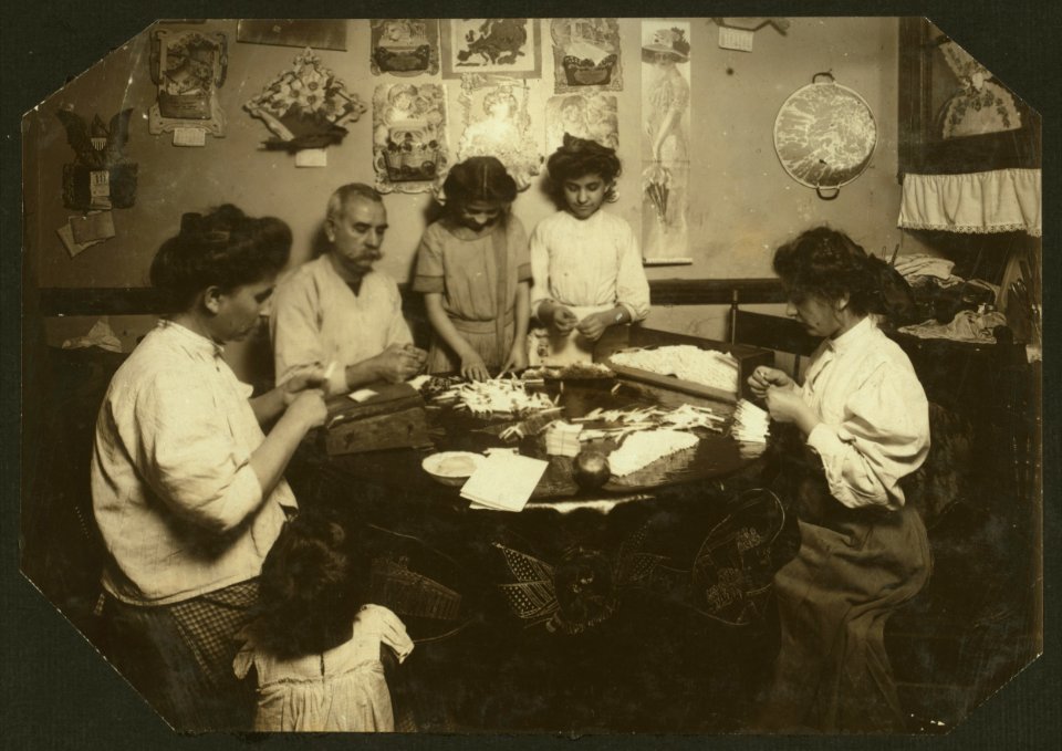 Whole family rolling cigarette cases, the mother was licking the papers as she worked. (For complete details see Miss E.C. Watson's report.) LOC nclc.04303