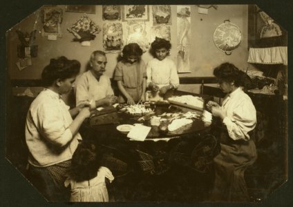 Whole family rolling cigarette cases, the mother was licking the papers as she worked. (For complete details see Miss E.C. Watson's report.) LOC nclc.04303