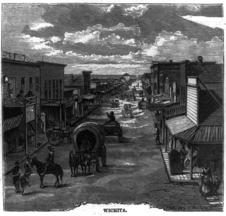 Wichita (Bird's-eye view of Wichita, Kansas, showing covered wagons on broad street) LCCN99614273