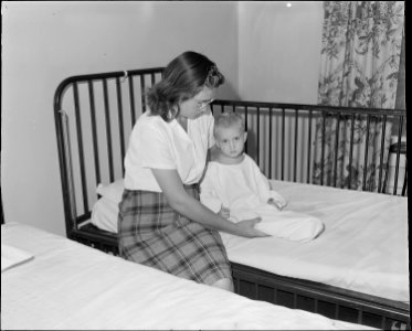 Wife and son of Conley Hoanker, a miner, who works for the Pocahontas Corporation, Mines 33-34, at Bishop, Virginia.... - NARA - 541097