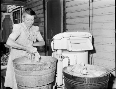 Wife of miner on washday. Southern Coal Corporation, Bradshaw Mine, Bradshaw, McDowell County, West Virginia. - NARA - 541060