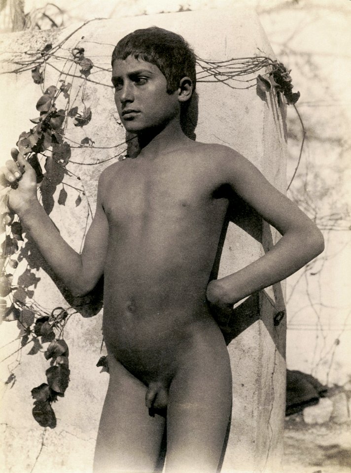Wilhelm von Gloeden Young male nude against wall 1890s