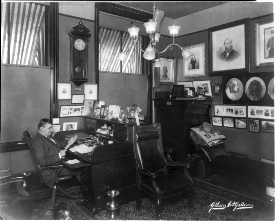 William A. Pinkerton, full-length portrait, seated, at desk, in well-furnished office LCCN2005685287