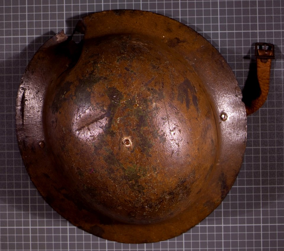 William Andrews' helmet, damaged by shrapnel
