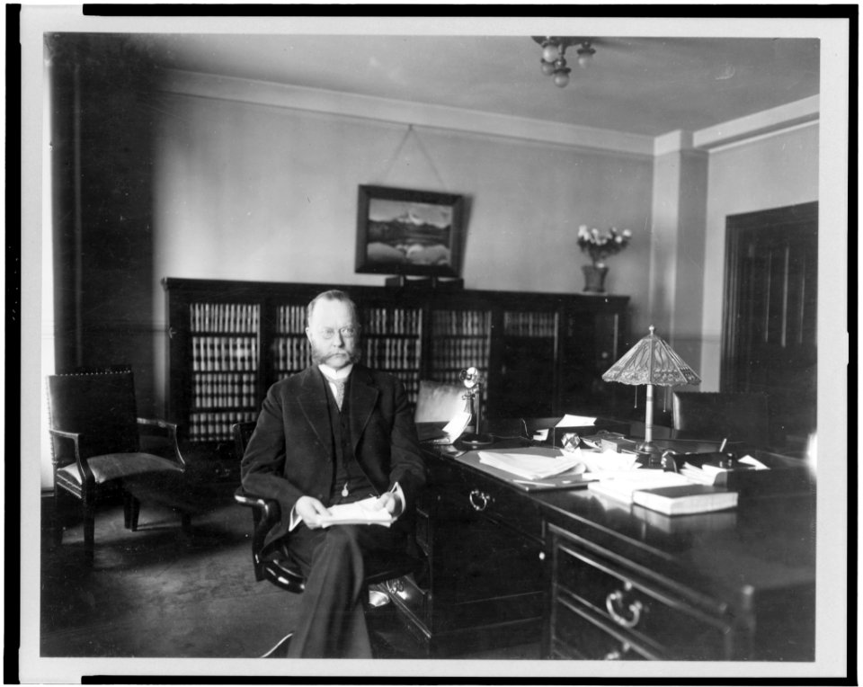 William C. Redfield, three-quarter length portrait, facing front, seated in office LCCN96500347
