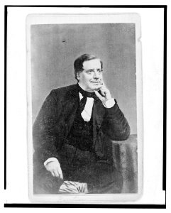 William E. Burton, actor and theatrical impresario, three-quarter length portrait, seated, facing right LCCN2004682539