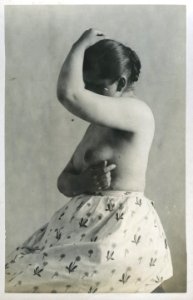 William Goldman, untitled (prostitute in brothel, wearing skirt with flowers), 1892-1900, vintage gelatin silver print, 14 x 8.9 cm