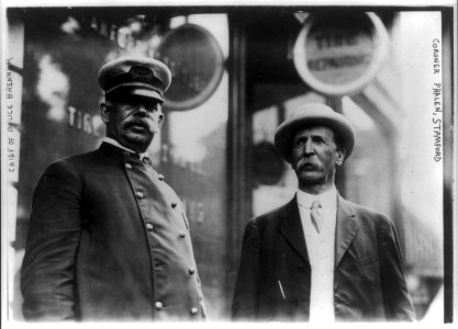 William H. Brennan, police chief of Stamford, Connecticut, half-length portrait, standing with Coroner Phalen LCCN2005685523