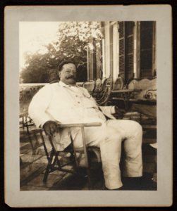 William H. Taft, seated in a wicker chair, probably during his tenure as Governor-General of the Philippines LCCN2013649079