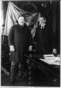 William Howard Taft, full length, standing, facing slightly right, with Elihu Root LCCN2006685745