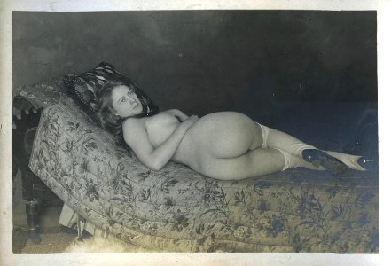 William Goldman, untitled (prostitute with white stockings in brothel, lying on bed), 1892-1900, vintage gelatin silver print, 8.9 x 14 cm