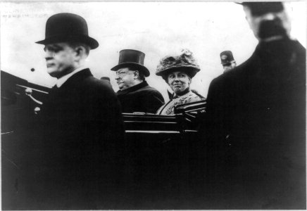 William Howard Taft, head-and-shoulders portrait, facing left; in car with his wife on Inauguration Day LCCN96513655