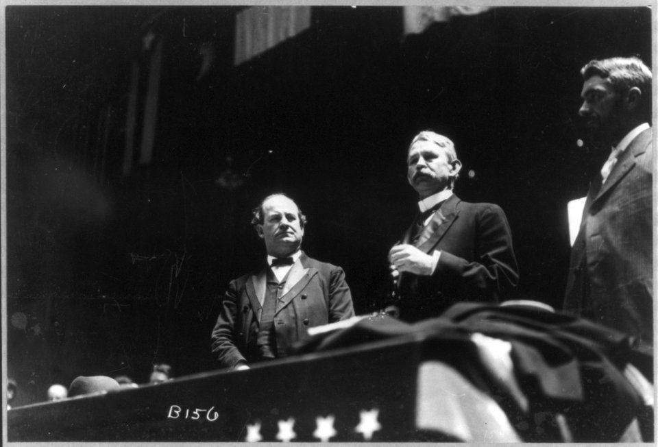 William Jennings Bryan, 1860-1925, half-length portrait, facing right, with two men LCCN2005691014