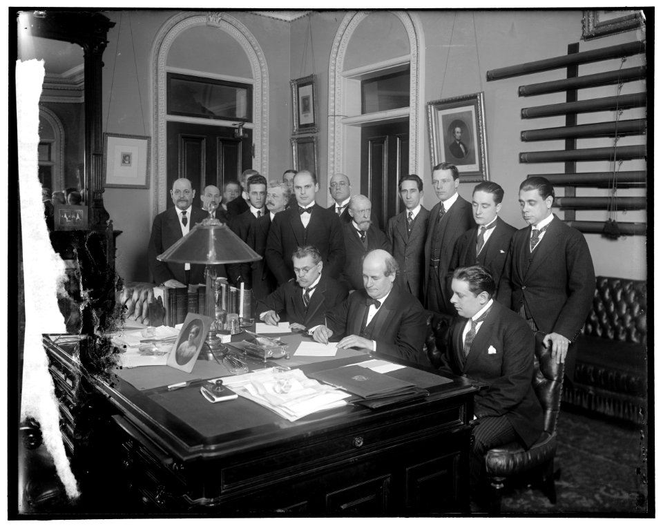William Jennings Bryan with group at desk LOC hec.13553