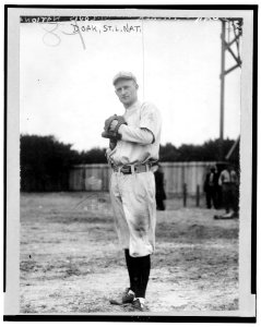 William Leopold Doak, St. Louis Cardinals baseball player, full-length portrait, facing front, standing, wearing uniform, about to pitch baseball LCCN2003689089