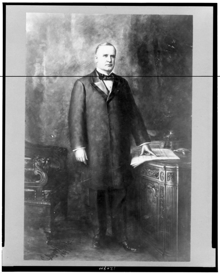 William McKinley, full-length portrait, standing, facing slightly right, hand on document LCCN98507501