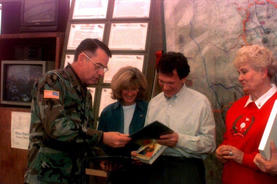 William Nash presents Tom Daschle a souvenir of their Easter Sunday visit to the troops of Operation Joint Endeavor in Bosnia Herzegovina