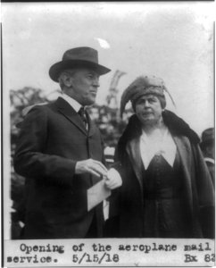 Wilson & wife at the opening of the aeroplane mail service LCCN2002695708