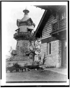 Windmill-shaped clock tower at left, and part of garage of Edmund Cogswell Converse at right, Greenwich, Connecticut LCCN94502484
