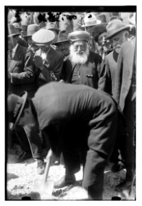 Winston Churchill planting his tree at the site of Hebrew University, Mount Scopus, Jerusalem; Jewish rabbi in center, 1921 LOC matpc.08802