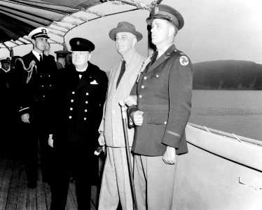 Winston Churchill with Franklin D. Roosevelt on board USS Augusta (CA-31) on 9 August 1941 (NH 67201)